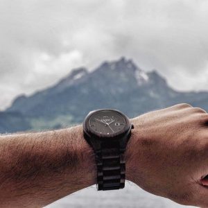 Model showcasing the Ambici Classic Black wood watch